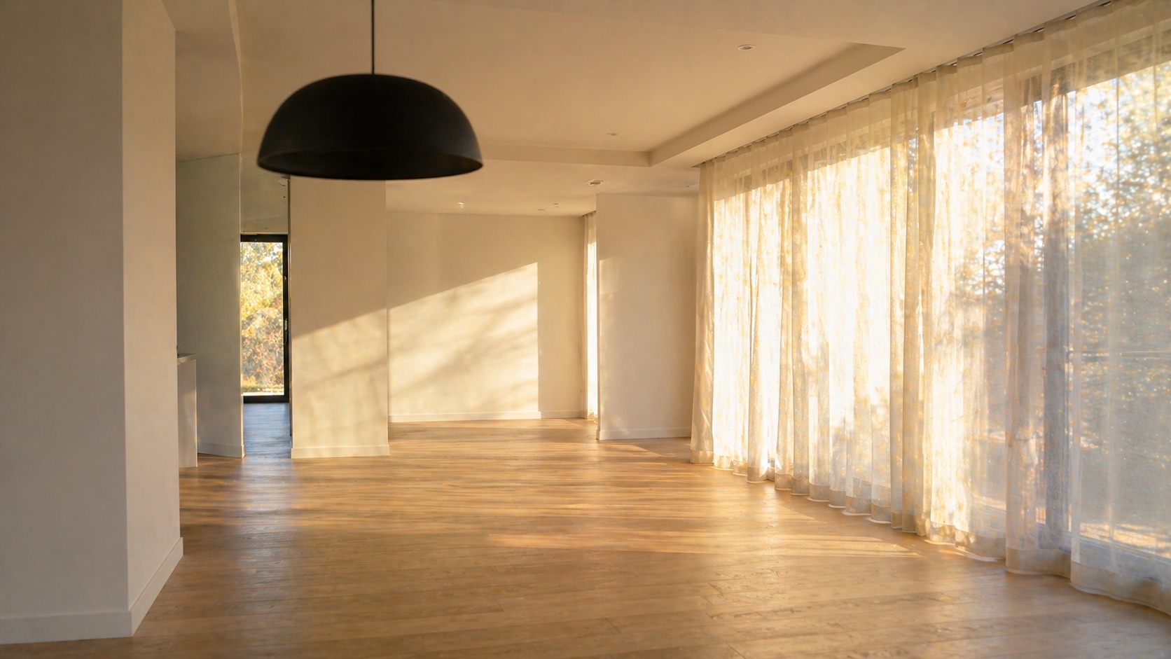 Empty modern living room in afternoon light — illustrating the question is refinancing worth it if moving within two years